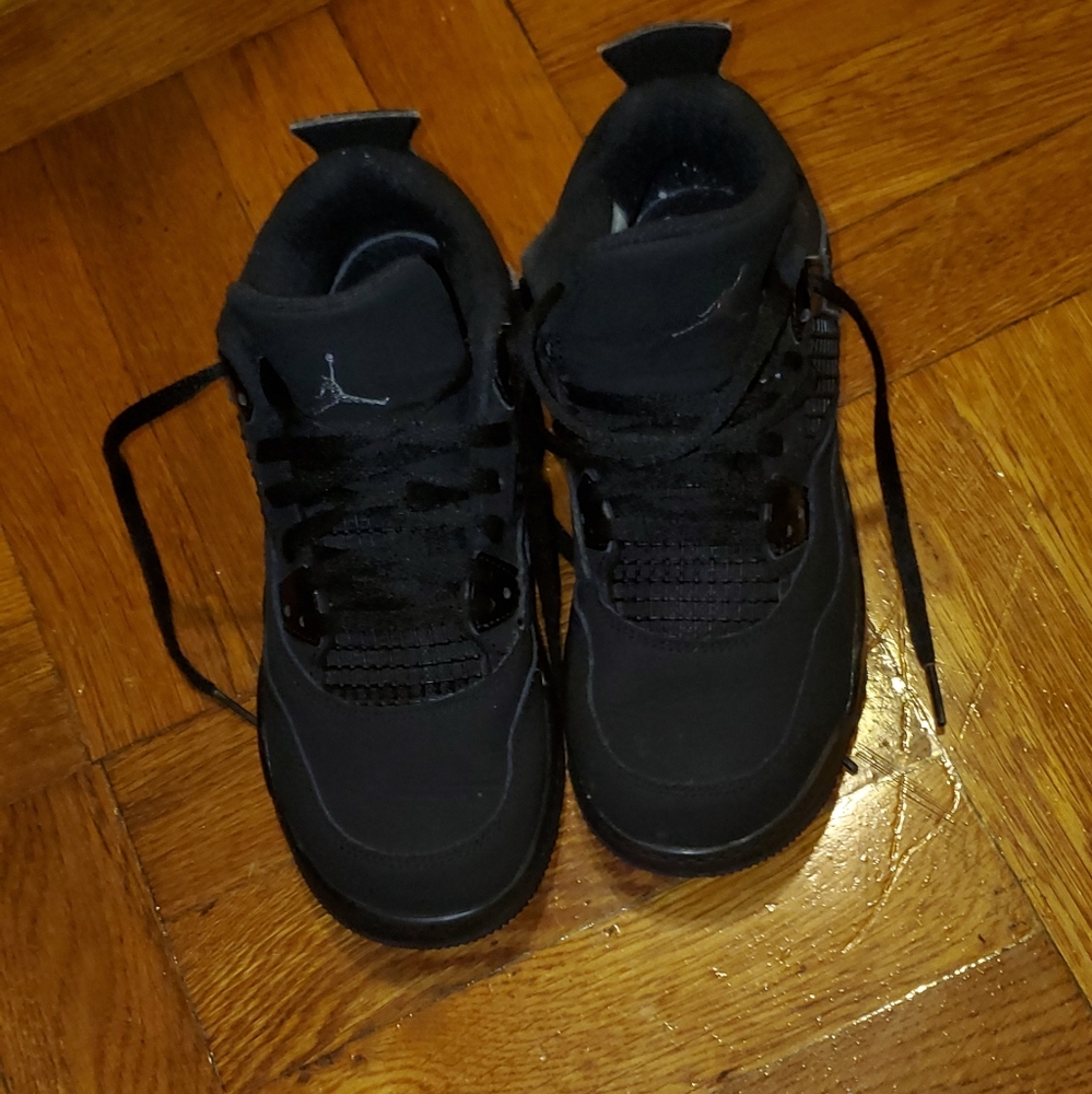 Boys black Nike Air Jordans size 2